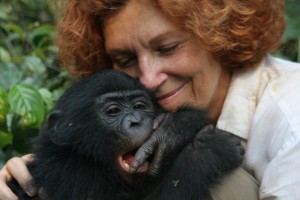 Claudine André and a young bonobo at Lola ya Bonobo sanctuary